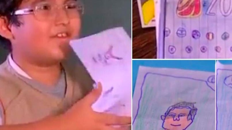 garçon de 8 ans brésilien dessine album panini coupe du
      monde football 2018