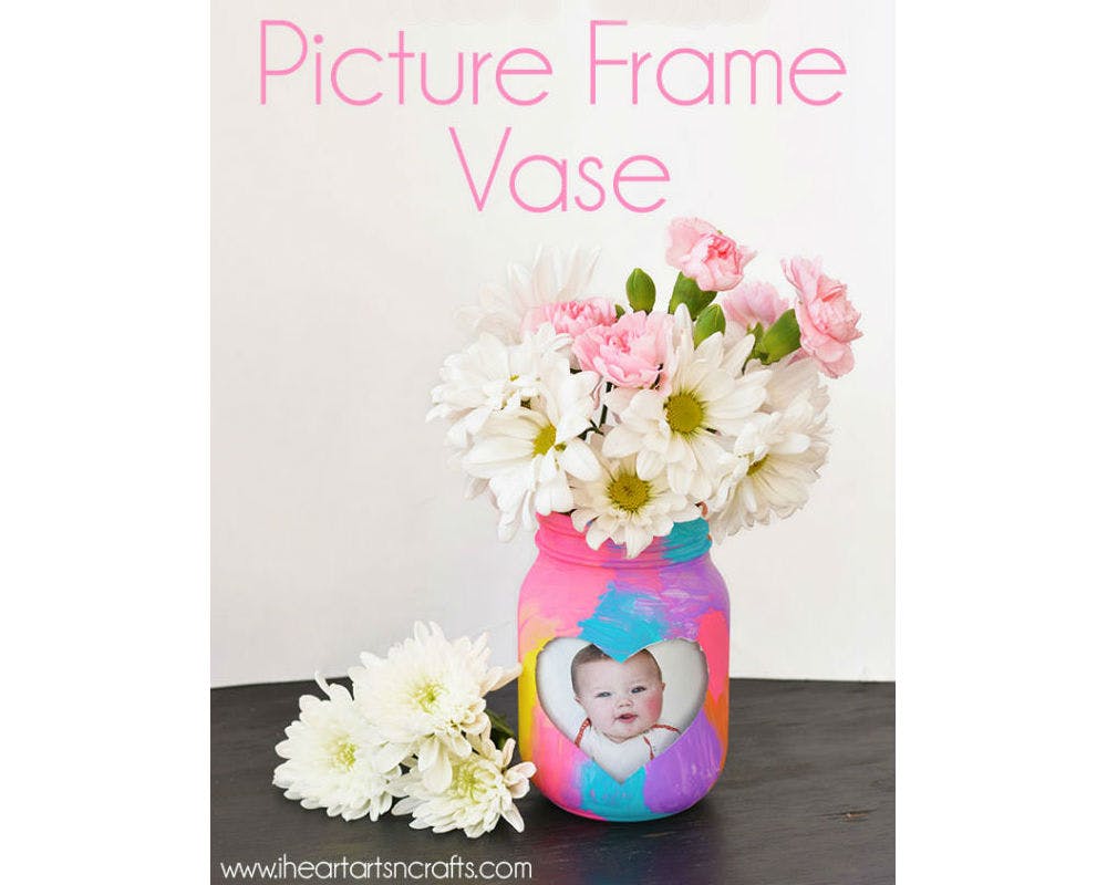 Vase et cadre photo à la fois
