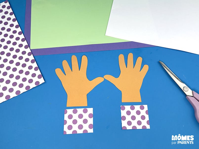 Découper les mains et le papier à motifs