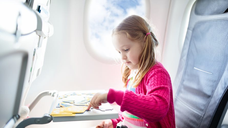 Découvrez nos conseils pour occuper son enfant lors d'un voyage en avion ou  en train