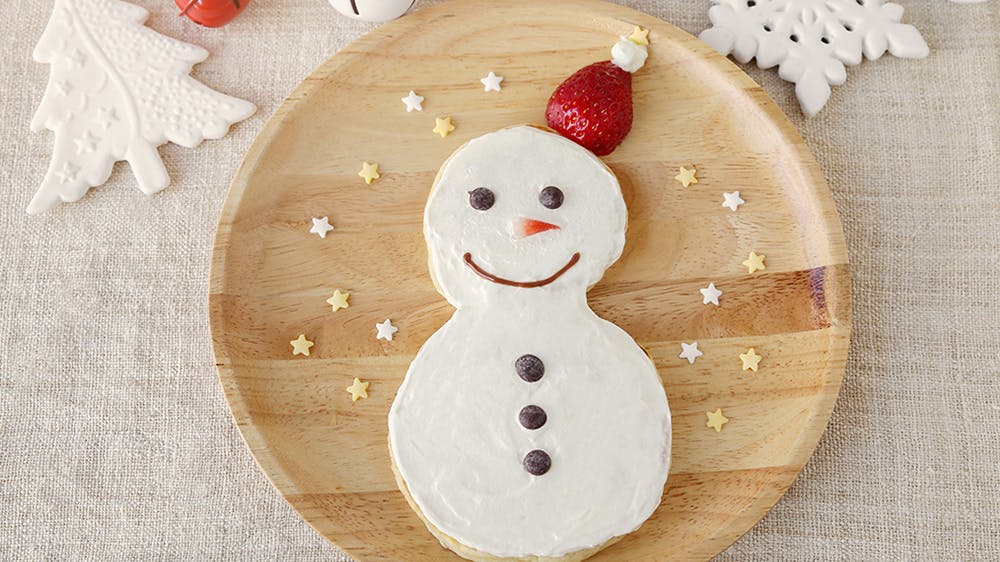Bonhomme de neige souriant en pancake