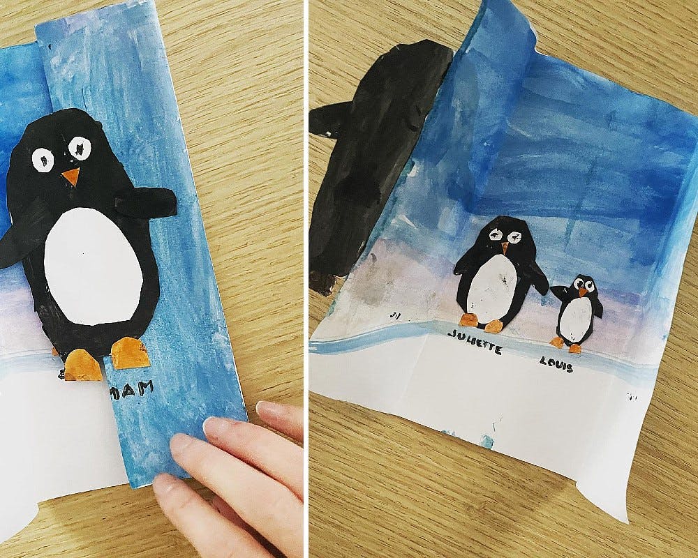 une carte de vœux avec des pingouins